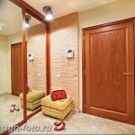 Elegance anteroom interior in warm tones with hallstand and mirror